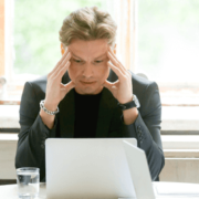 Employees gathered around stressing about data loss