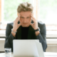 Employees gathered around stressing about data loss