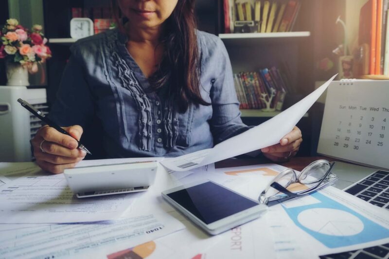 person calculating taxes